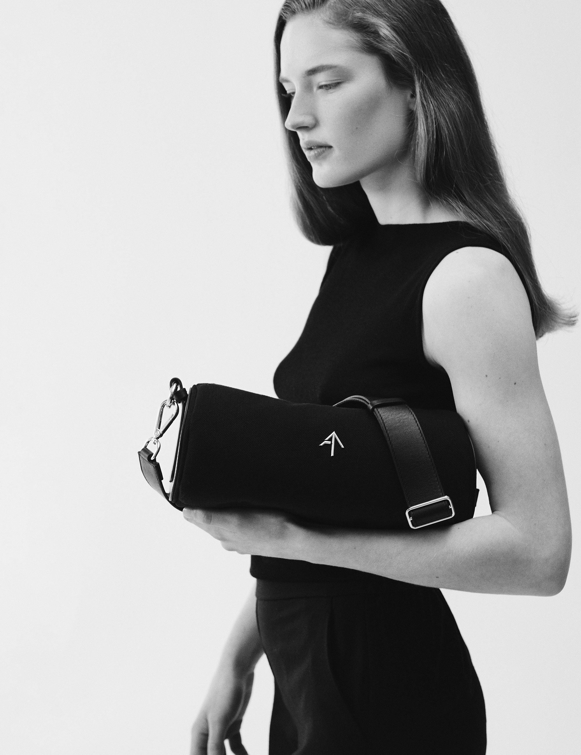 Cylinder Canvas Black with a model 