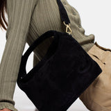 Mini Gala Suede Leather Black with a model