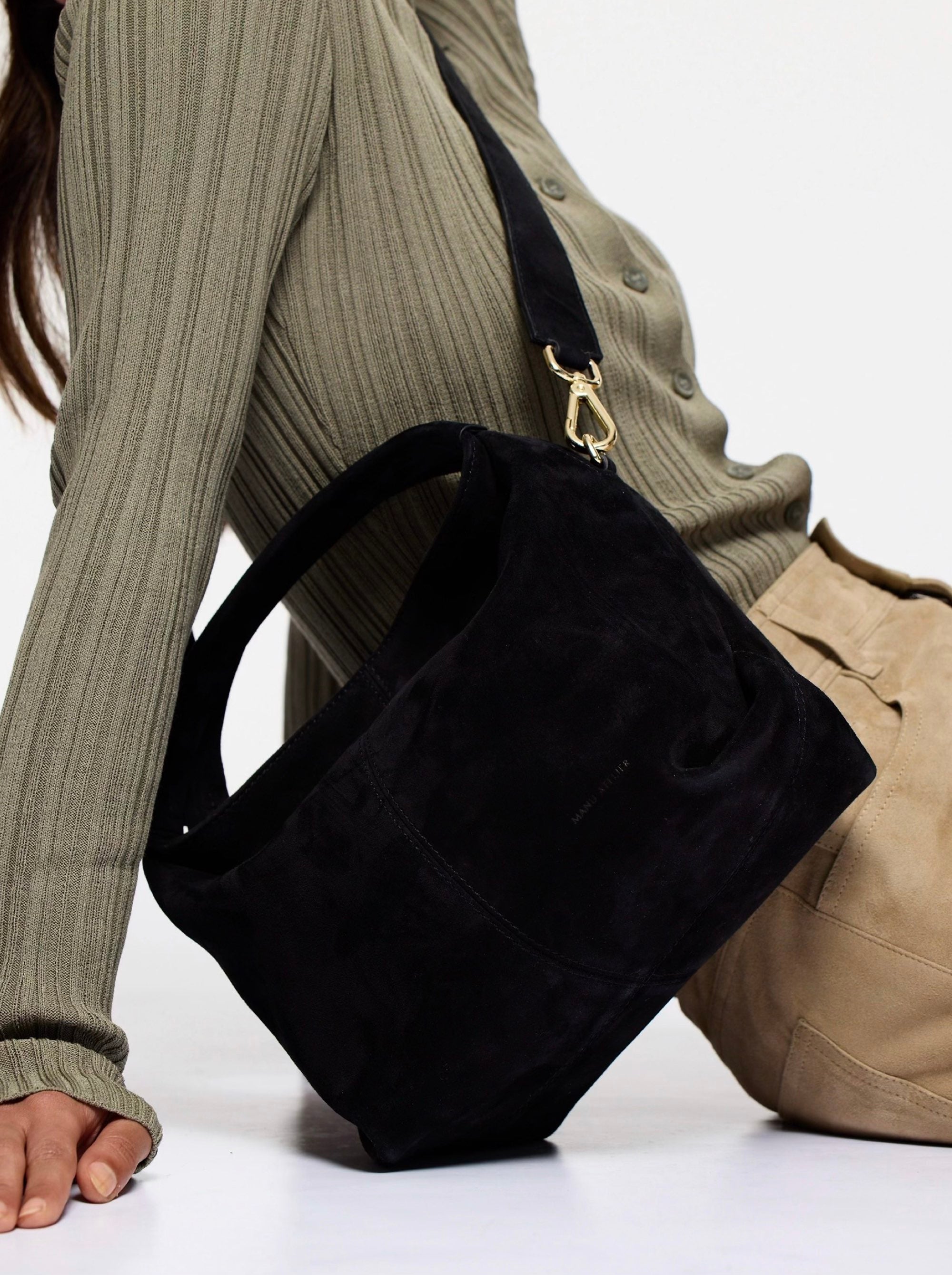 Mini Gala Suede Leather Black with a model